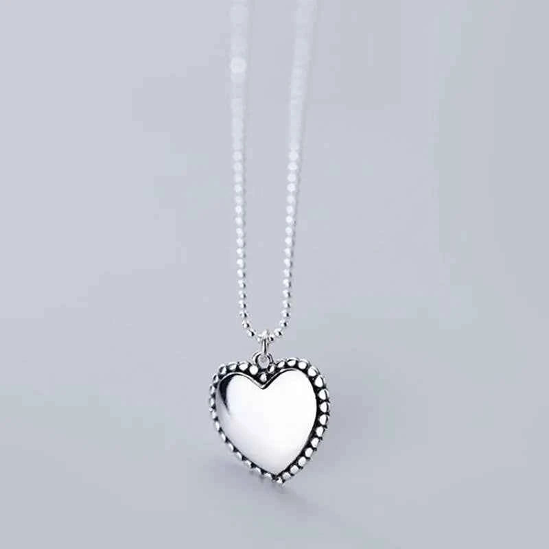 Shiny Heart Necklace with Beads and Round Design
