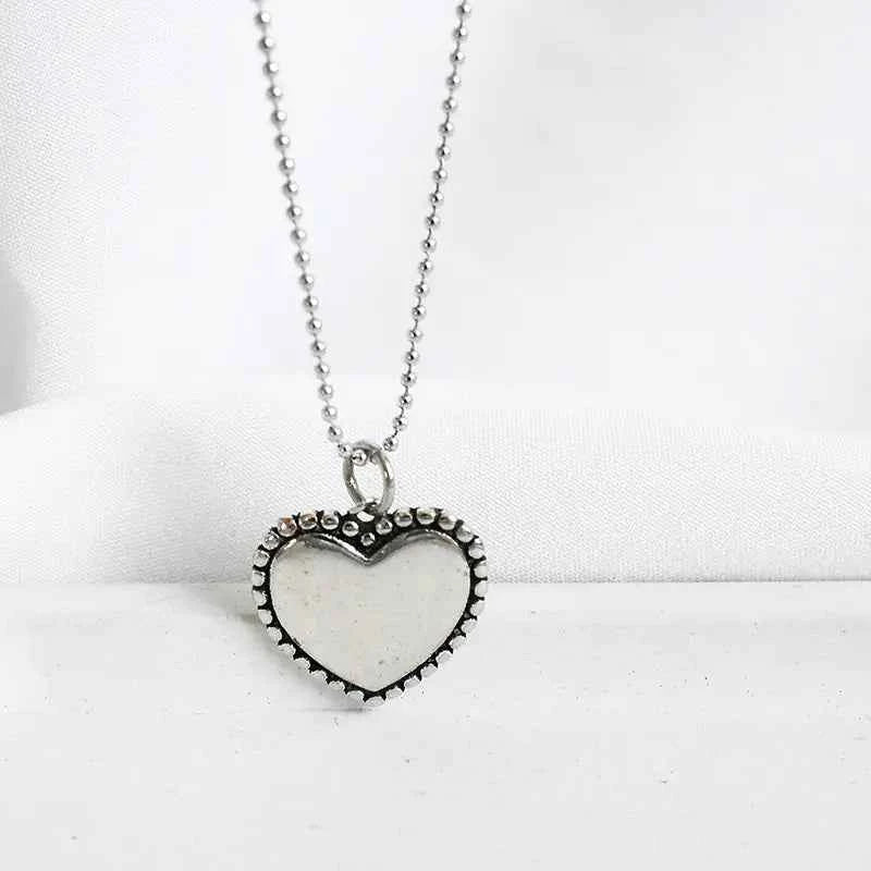Shiny Heart Necklace with Beads and Round Design