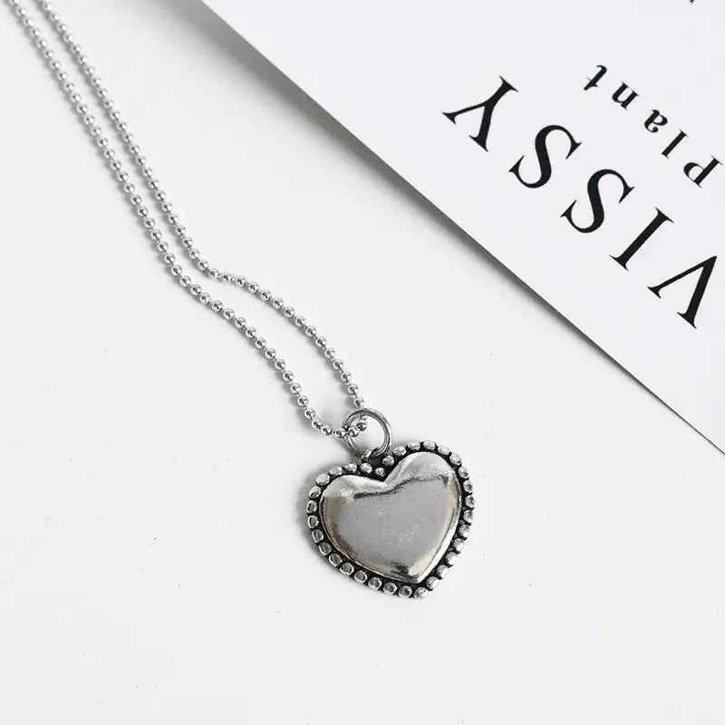 Shiny Heart Necklace with Beads and Round Design