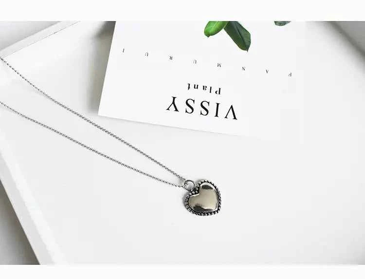 Shiny Heart Necklace with Beads and Round Design